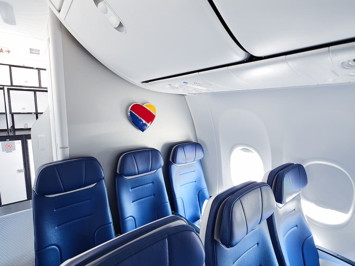 A shiny new interior of a Southwest Airlines plane.